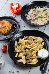 Set of different dishes