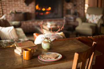 Breakfast at old cabin with crackling fire