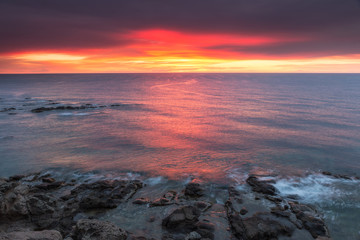 Sunrise on the coast of Escullos. Natural Park Cabo de Gata. Spain.