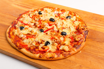 Pizza on a wooden board