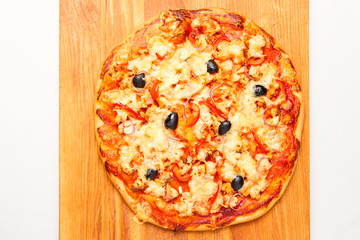 Pizza on a wooden board