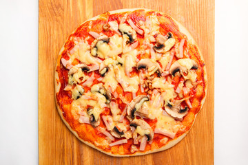 Pizza on a wooden board