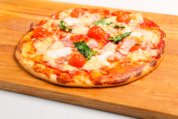 Pizza on a wooden board