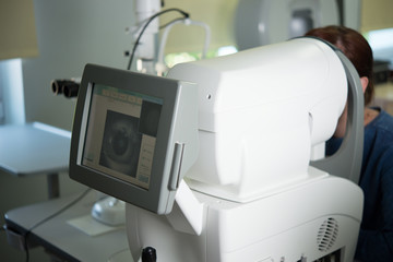 The ophthalmologist conducts the research with the help of various equipment, a contactless tonometer, for the diagnosis of eye disease