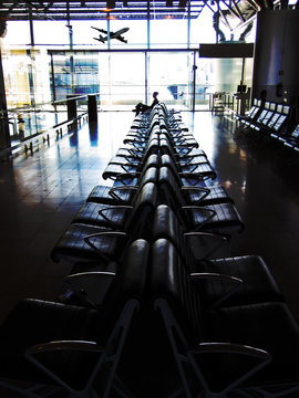 Travel concept, man waiting in airport .
