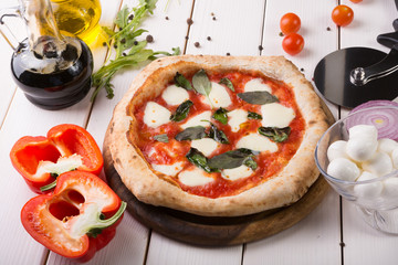 Pizza on wooden board