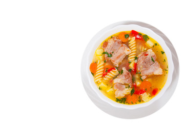 soup with meat, pasta and vegetables. top view. isolated on white