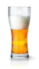Half glass of light beer with foam