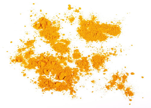 Turmeric (Curcuma) powder isolated on white background, top view