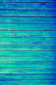 Blue or Azure Wooden Wall Planks Vertical Texture. Old Retro Wood Rustic Shabby Background. Peeled Azure Weathered Surface. Natural Wood Board Panel.