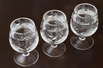 Crystal  glasses on dark background.