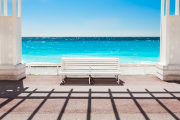 White bench on the Promenade des Anglais in Nice, France