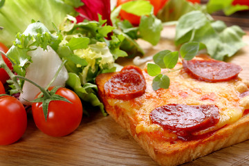 Fresh toast with cheese and chorizo sausage