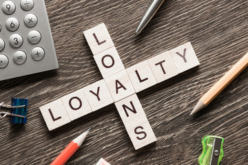 Loans and loyalty crossword puzzle collected of game wooden cubes