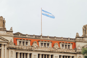 Argentine flag on building of the Supreme Court of Justice in Buenos Aires