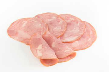 Fresh sliced smoked ham isolated on white background