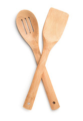 Top view of wooden kitchen spoon and spatula
