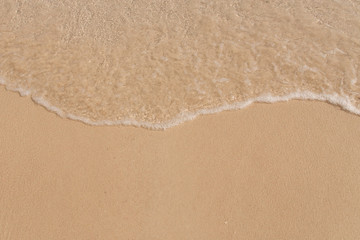 Sand beach and sea wave