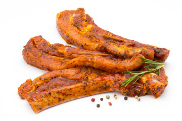 Spicy marinated spare ribs barbecued on the white background.