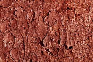 Red toned pine tree bark pattern.