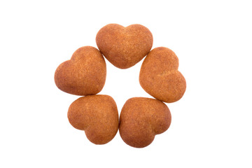 Honey heart shaped cookies isolated on white background.