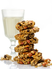 Kozinaki, briquettes of sunflower seeds, candied sugar, caramel or honey with glass of milk