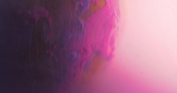 Abstract spherical models made of plasticine, immersed in liquid. Closeup. 4K. Camera RED.
