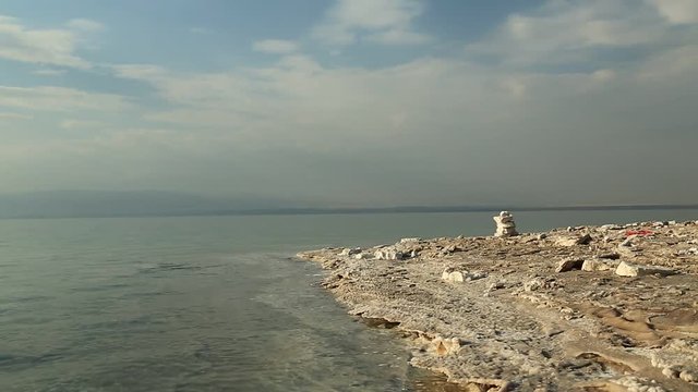 White salt deposits of Dead Sea. Salt on the shore of Dead Sea in Jordan
