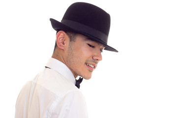 Young man in white T-shirt with black hat