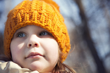 Portrait of a child close-up in a hat