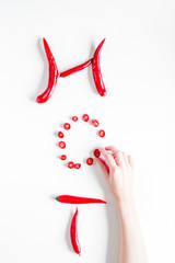 chili food with red pepper hot text on white background top view