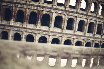 Obraz premium Magnificent view of the Great Roman Colosseum ( Coliseum, Colosseo ),also known as the Flavian Amphitheatre. Famous world landmark. Scenic urban landscape. Rome. Italy. Europe