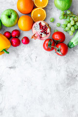 fresh vegetables and fruits for fitness dinner on stone background top view mockup