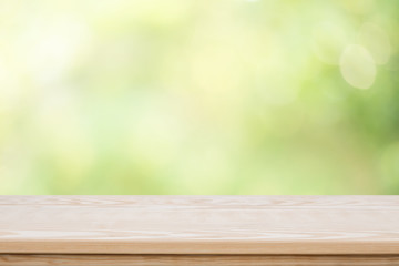 table top on green blurred  background,Space for placing products