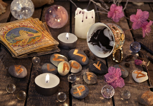 Mystic still life with coffee grounds, tarot cards and sone runes reading. Divination rite