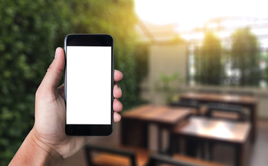 Mockup mobile  image of hand phone with blank white screen vintage tone.