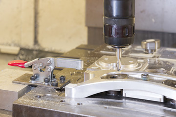 The CNC milling machine cutting the sample part with the ball end mill .The ball end mill cutter for CNC machine with toggle clamp