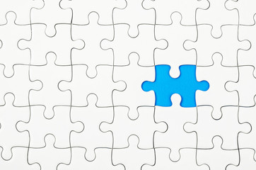 Fototapeta premium White jigsaw puzzles.