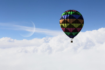 Aerostat flying above clouds