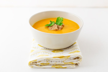 Pumpkin cream soup in a bowl