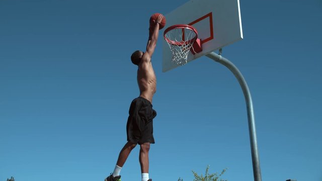Super slow motion shot of basketball basketball slam dunk, shot on Phantom Flex 