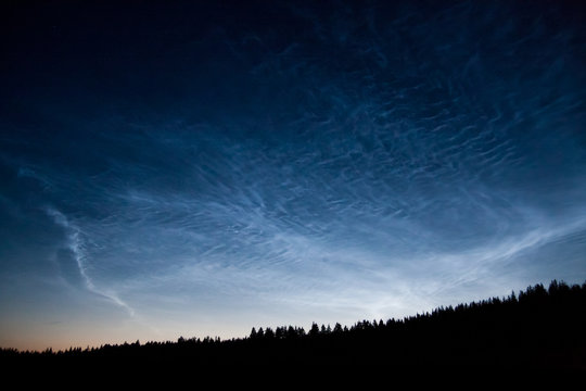 Noctilucent clouds at night