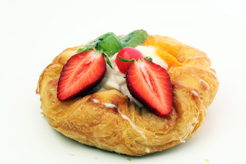danish pastry with strawberry, kiwi and tangarine