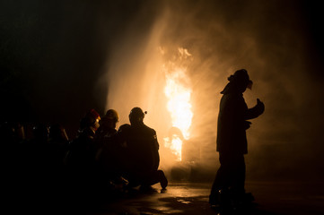 Fototapeta na wymiar firefighters in teamwork operation
