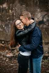 Fototapeta premium A young couple in love hugging and kissing