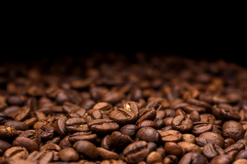 Coffee beans. Dark background with copy space, close-up