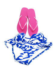Female swimsuit and beach sneakers on a white background