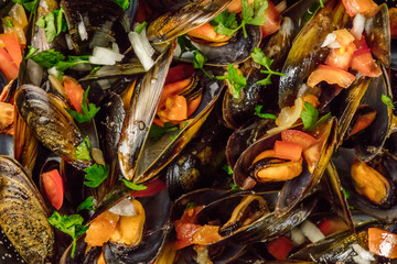 Closeup of marinara mussels, shot from above
