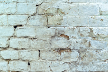 Old weathered white brick wall texture