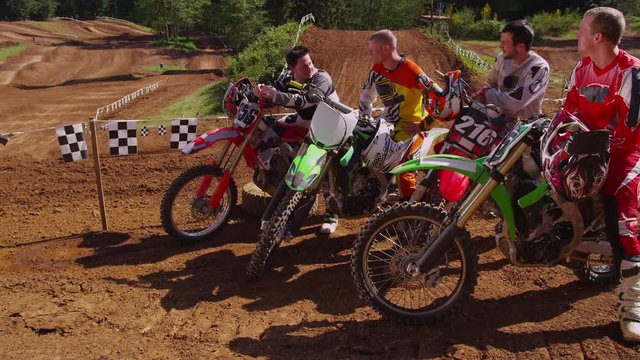 Group of Motocross racers hanging out 